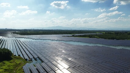 Large scale floating solar power station on water surface under blue sky © zhangyang135769