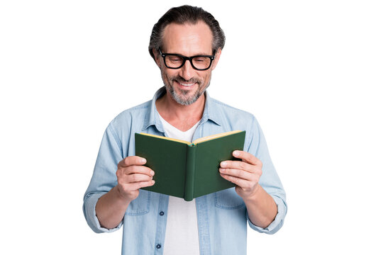 Photo of handsome mature man happy positive smile enjoy look red book story novel isolated over grey color background