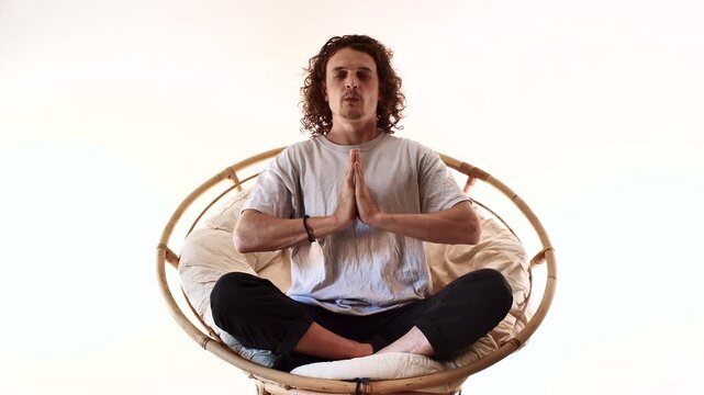 Full Body Man Meditating in Spiritual Mindfulness Pose on Circular Seat