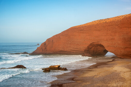 Famous red rock arch on Legzira Beach in Morocco
