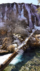 Winter Waterfall and Turquoise Pool in Jiuzhaigou © 纪 曹