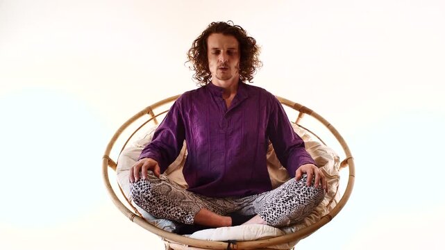 Full Body Man Meditating in Spiritual Mindfulness Pose on Circular Seat