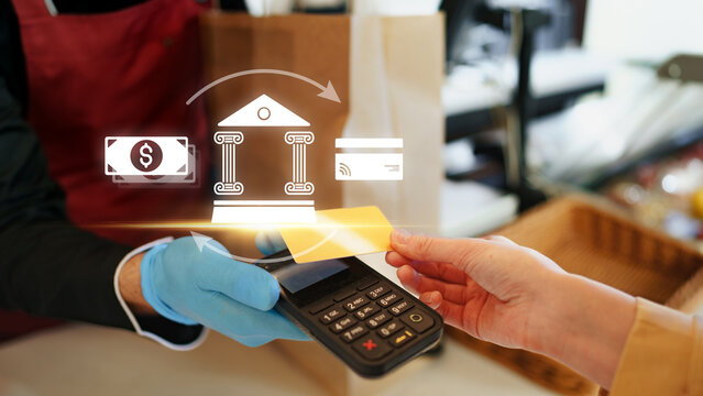 Online payment process at a store with cash and card transaction during a busy shopping day