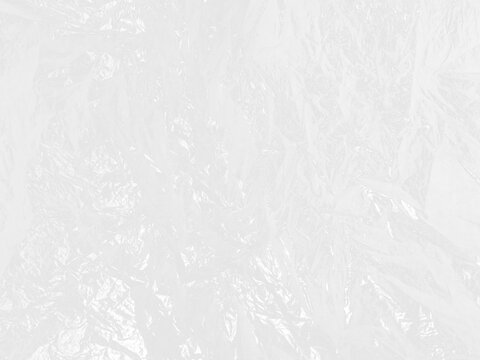 Plastic warp allover crumpled texture. Detailed crushed cellophane plastic sheet with rich texture and reflective gloss.