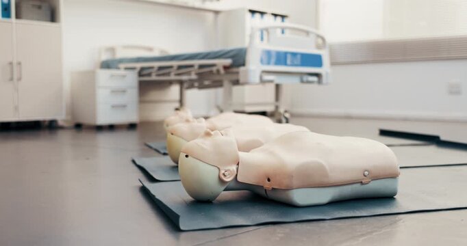 Healthcare, mannequin and CPR course in clinic, empty and training equipment for life support class. First aid, education and dummy on mat for rescue technique, practice and medical simulation