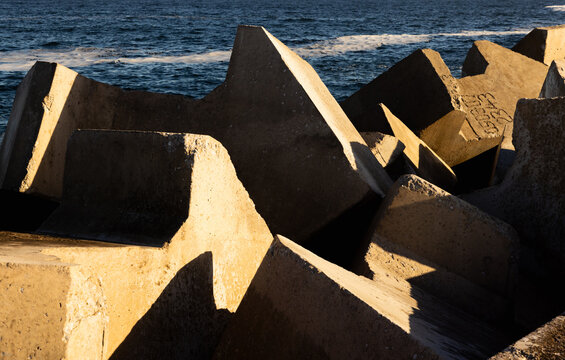 concrete breakwater constructions, New Harbor, Hermanus, South Africa