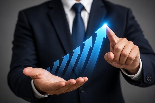 Businessman holding glowing upward arrow graph over hands in dark suit