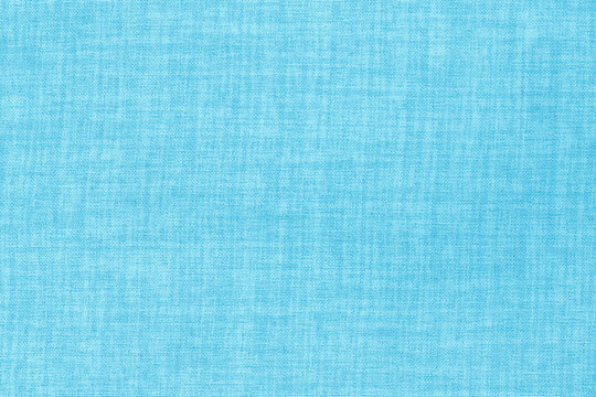 Blue pastel linen fabric texture background, seamless pattern of natural textile.