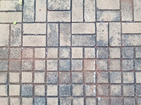 Top view of concrete paving block tiles pattern on outdoor walkway