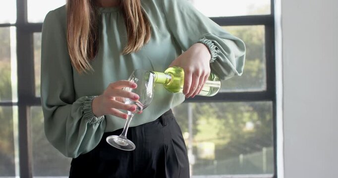 Lifestyle videos indoor of people doing activities at office, woman taking break in modern office se