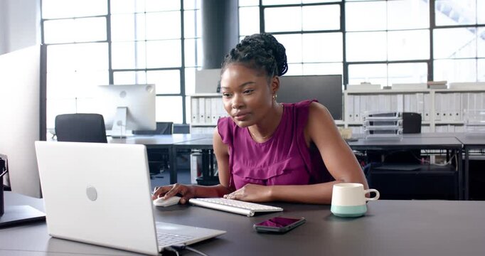 Lifestyle videos indoor of people doing activities at office, working in office, woman using laptop