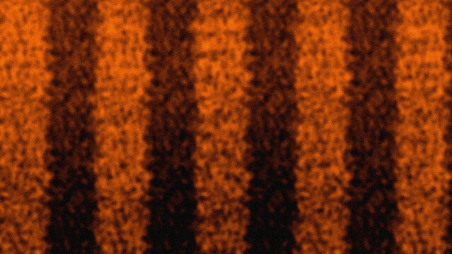 Abstract orange and black vertical pixelated striped pattern