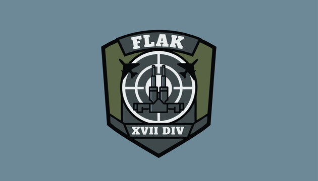 Military aviation emblem or patch featuring fighter jet silhouettes, a target scope, and the text FLAK XVII DIV.