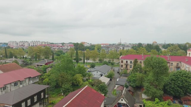 POTI, GEORGIA - AUGUST 29, 2026: Panoramic view of a little town Poti with red roofs and lush greenery.