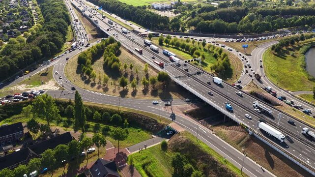 Traffic at a highway junction at Zwolle where the A28 highway runs through the city in Overijssel, The Netherlands.
