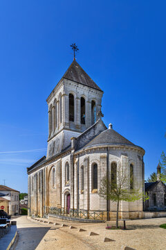 Church of Saint Pierre Es Liens in Bourdeilles, France, view from the apse. Romanesque architecture under clear sky