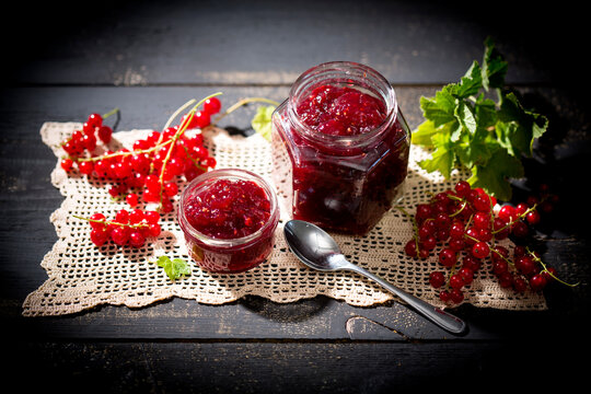 Homemade currant jam and red currants, Ribes rubrum