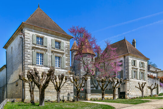 Chateau des Senechaux in Bourdeilles, France, frontal view. Historical medieval stone castle under bright daylight