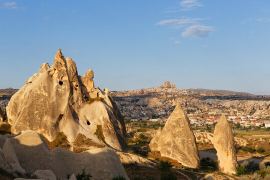 Turkey, Cappadocia, fairy chimneys at Goereme National Park in front of the villages Goereme and Uchisar