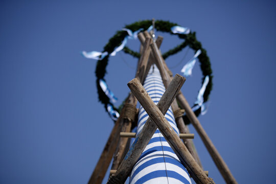 Germany, Bavaria, Penzberg, Maypole, low angle view