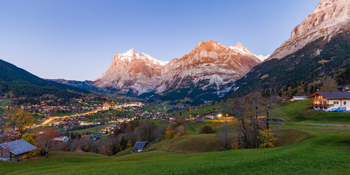 Switzerland, Bern, Bernese Oberland, holiday resort Grindelwald, Wetterhorn, Schreckhorn and Eiger in the evening