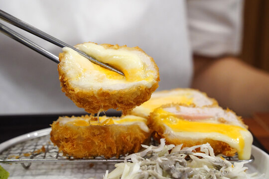 Crispy Japanese cheese tonkatsu pork cutlet filled with melted mozzarella and cheddar cheese