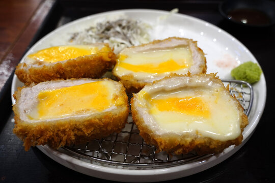 Crispy Japanese cheese tonkatsu pork cutlet filled with melted mozzarella and cheddar cheese