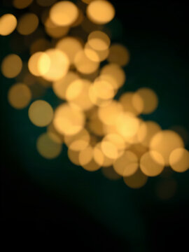 Champagne Gold and Emerald Bokeh Lights on Dark Luxury Abstract Background