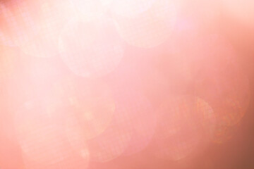 Fototapeta premium Soft pink bokeh background with blurred circular light spots creating a dreamy and abstract visual effect suitable for various design applications