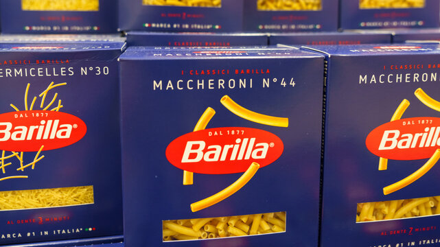 Barilla pasta boxes displayed on a shelf in Moscow, Russian Federation, featuring various types including maccheroni and vermicelles in a grocery store setting