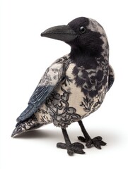 Obraz premium Decorative Crow Figurine With Black Lace Pattern On Beige Fabric Texture Against White Background