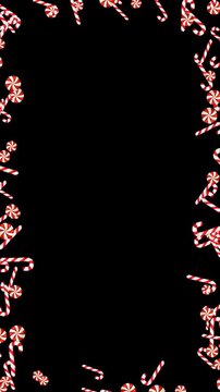 Falling Red Candy Canes and Peppermints border frame Isolated Alpha Channel Animation ,Christmas and New Year Holiday Celebration Videos Overlay vertical social media motion design element