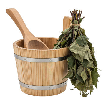 Wooden sauna bucket with ladle and dried birch leaf whisk bundle isolated on a transparent background