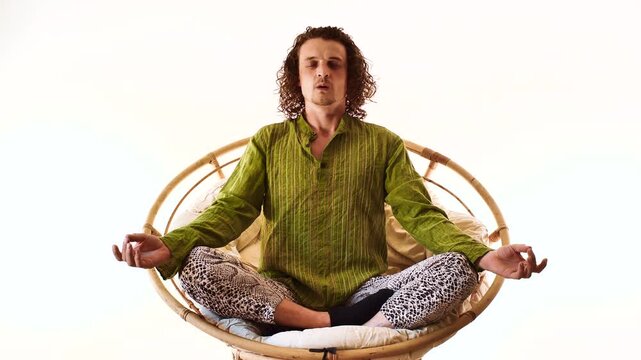 Full Body Man Meditating in Spiritual Mindfulness Pose on Circular Seat