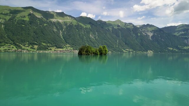 Scenic Lake Brienz panorama with Iseltwald island in Switzerland