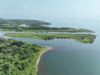 Obraz premium Aerial View of the Adogawa River Mouth Flowing into Lake Biwa, Shiga Prefecture, Japan – Scenic Coastal Landscape 