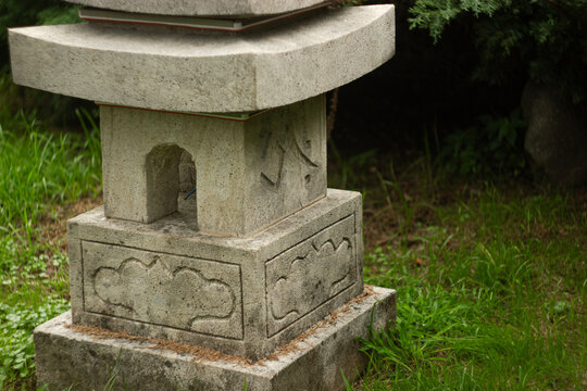 Japanese old stone lantern in garden