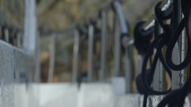 Ropes on a railing on a boat