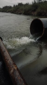 Sewage flows from pipe into water pond, polluting marine sea ocean river ecosystem AI Generative