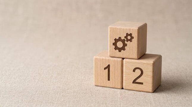 Wooden blocks with numbers one two and gear icon stacked on beige fabric background, symbolizing business steps, process management and strategic planning.