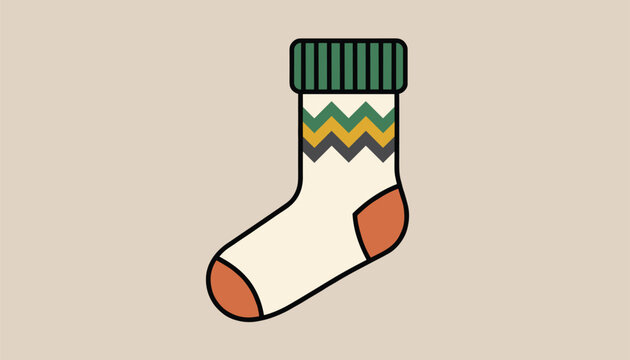 Cozy knitted woolen winter sock with a green and yellow chevron pattern isolated on a solid warm beige background.