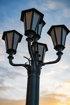 Street lamp architecture. Street lamp lantern in park architecture. Elegant lamp in classicism style. Decorative architectural details