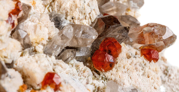 Natural Spessartine Garnet Crystals in Matrix Isolated on White