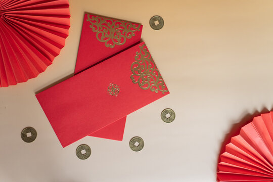 Red Envelopes, Fans, and Chinese Coins