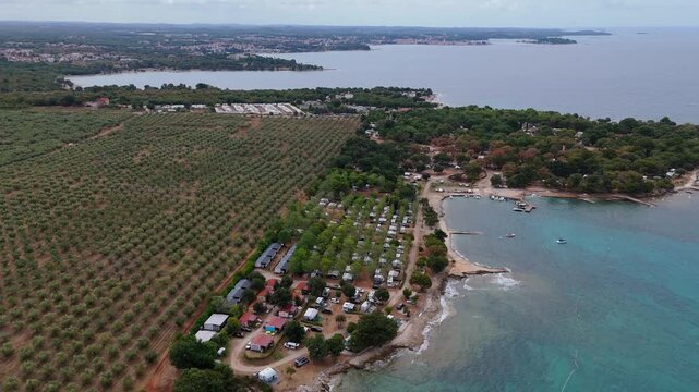 FKK Camping Ulika Near Porec With Campervans Aerial Drone View During A Sunny Summer Day On The Beautiful Adriatic Coast In Istria Croatia