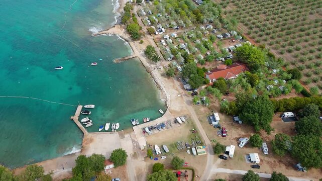 FKK Camping Ulika Near Porec With Campervans Aerial Drone View During A Sunny Summer Day On The Beautiful Adriatic Coast In Istria Croatia