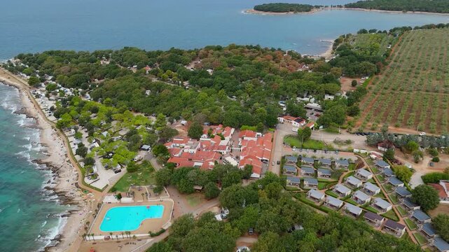 FKK Camping Ulika Near Porec With Campervans Aerial Drone View During A Sunny Summer Day On The Beautiful Adriatic Coast In Istria Croatia