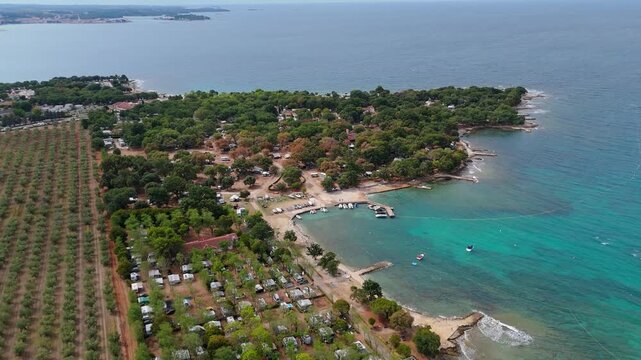 FKK Camping Ulika Near Porec With Campervans Aerial Drone View During A Sunny Summer Day On The Beautiful Adriatic Coast In Istria Croatia