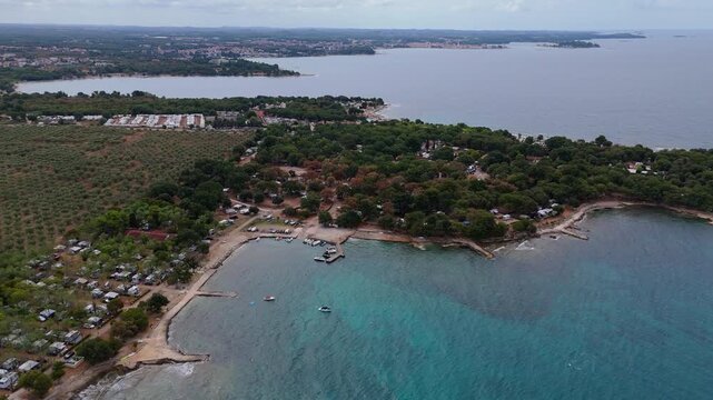 FKK Camping Ulika Near Porec With Campervans Aerial Drone View During A Sunny Summer Day On The Beautiful Adriatic Coast In Istria Croatia