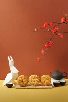 Mid-Autumn Festival tea set with traditional mooncakes origami rabbit and plum blossoms